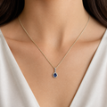 Oval Sapphire & Diamond Halo Pendant, 18K White Gold — view 3